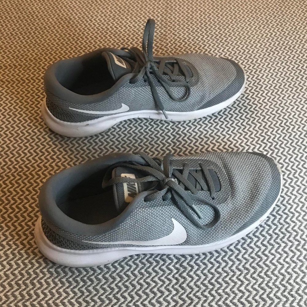 grey Nike running shoes